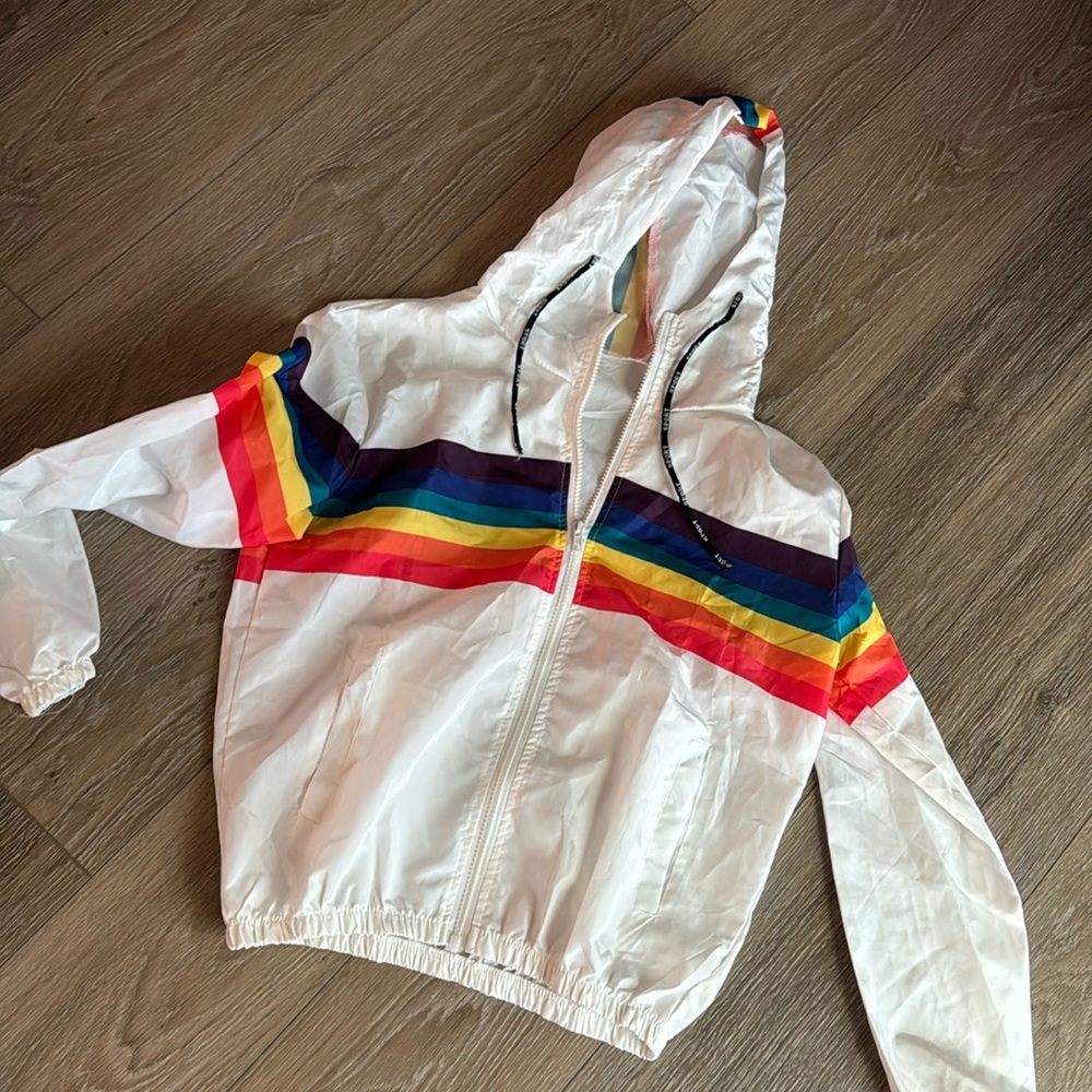 White windbreaker with rainbow pattern